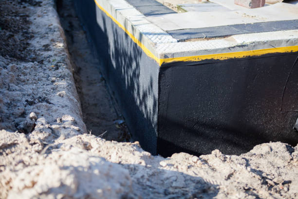 Professional Waterproofing technician working in Chunchula, AL